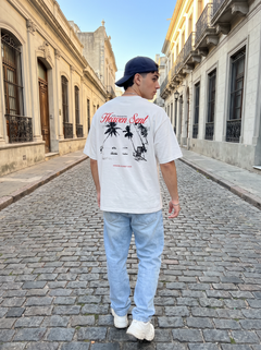 Remera blanca Sunset Heaven Sent, estampado en la espalda, en Ciudad Vieja, Montevideo
